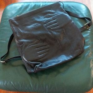 Artsy black leather shoulder bag w holding hands🤗